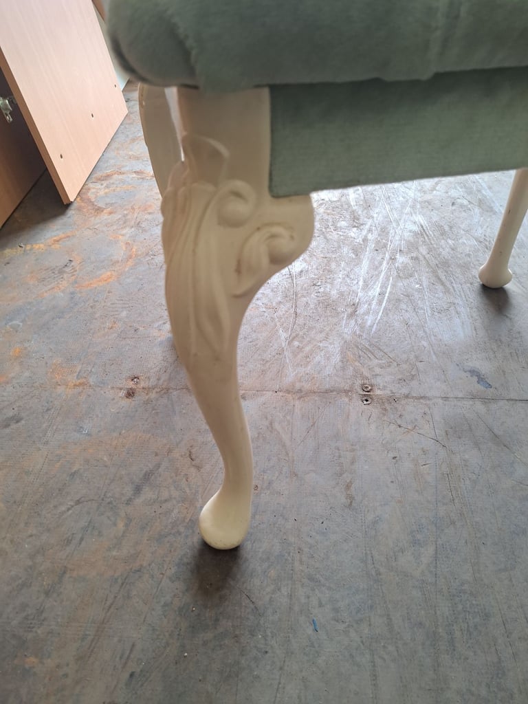 white wood framed stool with fabric padded seat