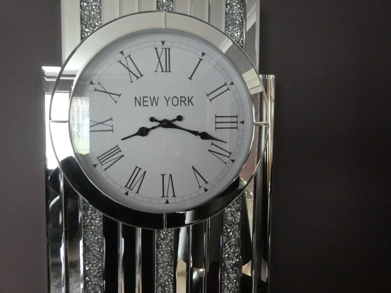 image for Beautiful Beveled mirror wall clock. Large clock face. 66cmLx35cmWx5cmD. brand new condition.