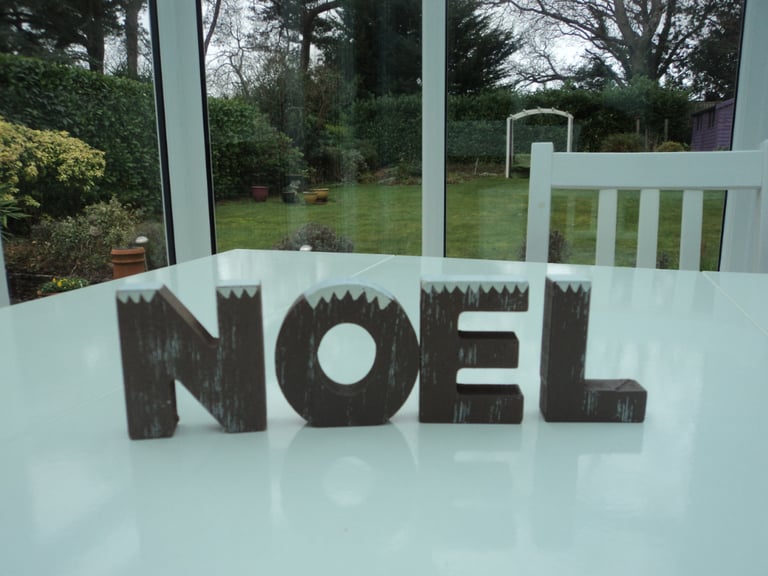 Christmas decoration 'NOEL' wooden letters. 