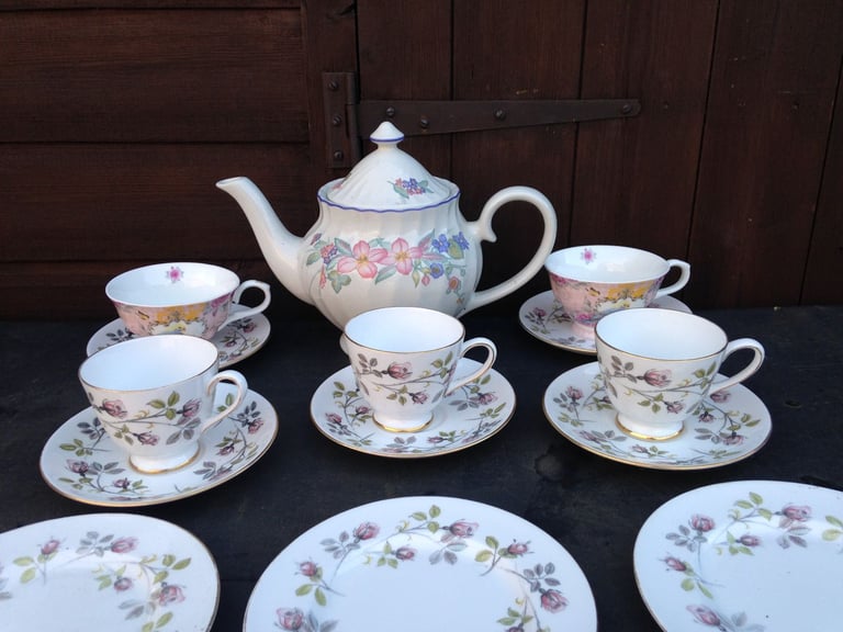 China tea pot , cups , saucers plates , set 