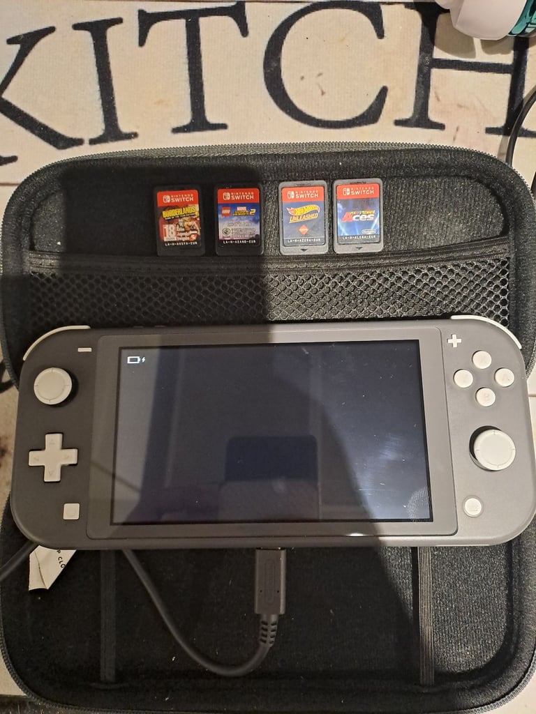 Nintendo switch lite with games and headset
