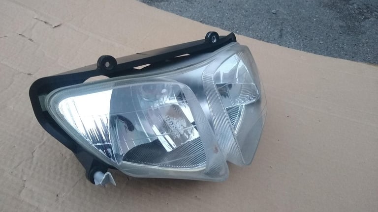PGO T-Rex moped scooter headlight, new condition.
