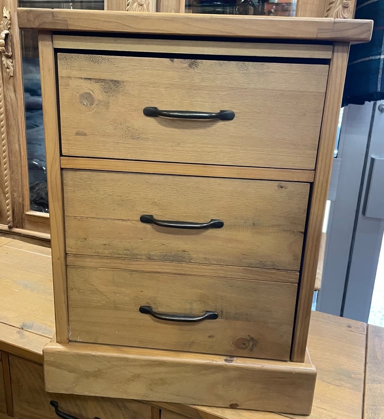 Two, solid wood bedside cabinets.
