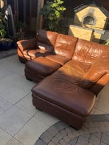Tan real leather sofa with matching pouffet
