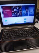 Dell laptop and bag/case. 8GB RAM, i5 CPU, 128GB SSD SOLID STATE DRIVE, Backlit keyboard