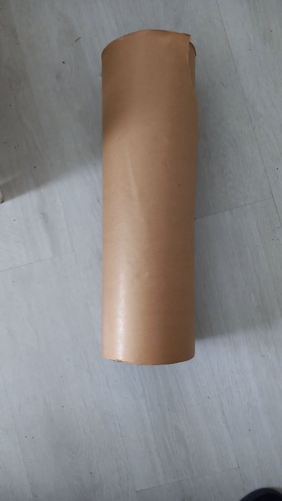 Large roll lots on brown wrapping crafting paper