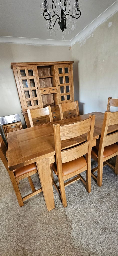 Oak dining table with six chairs and oak dresser