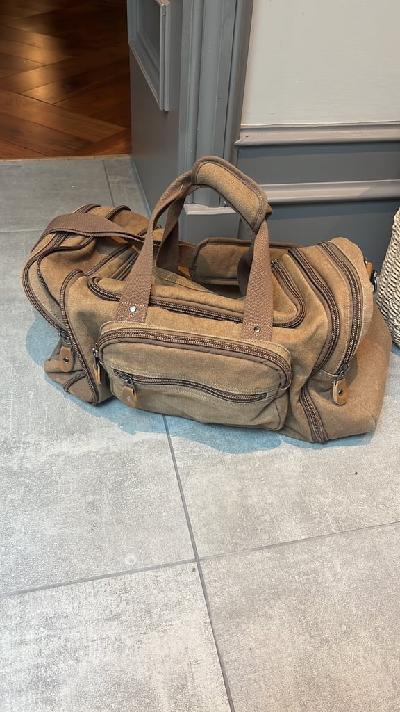 image for Beige duffle bag