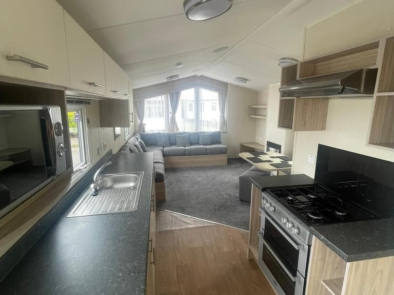 Sited static caravan for sale with decking - Lyons Robin Hood North Wales Rhyl
