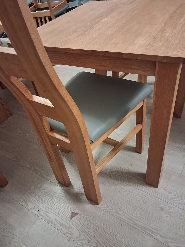 Solid oak 2 seater table plus pair of Oakfurnuture land chairs vgcs