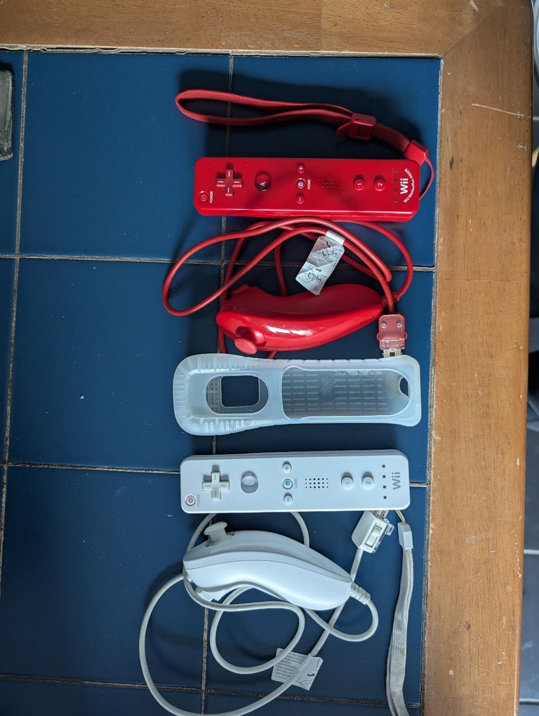 image for Original Nintendo Wii motes and nunchucks