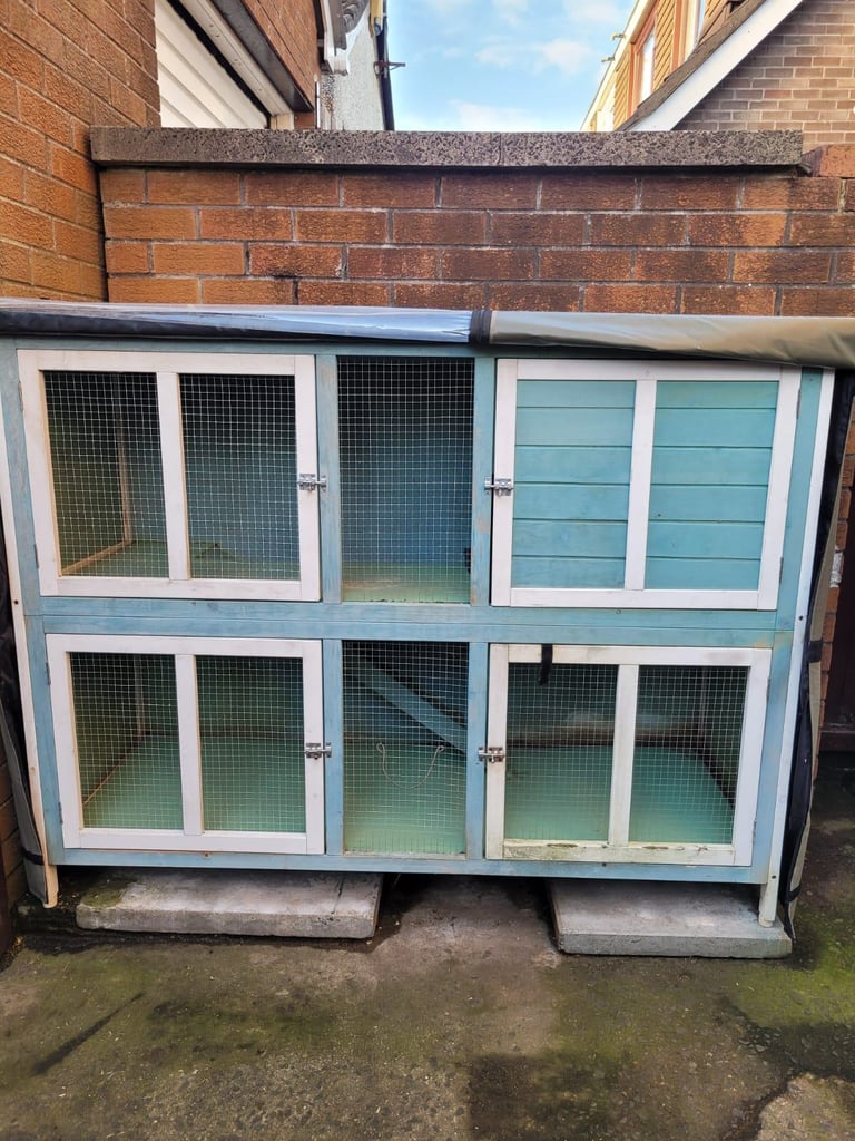 2 storey rabbit hutch with thermal rain cover.