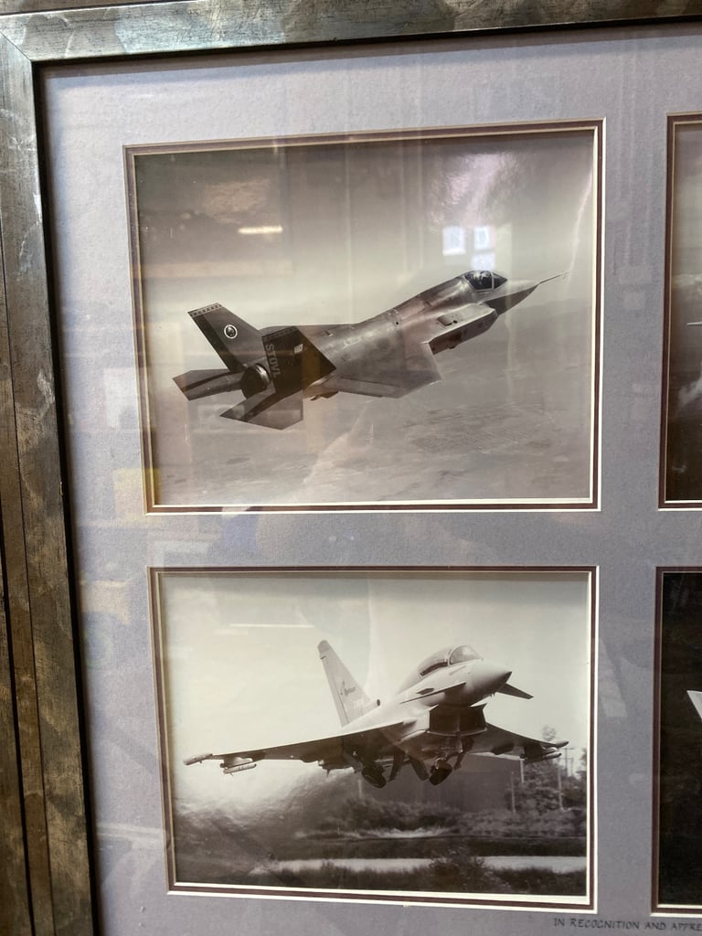 Six war planes in picture frame