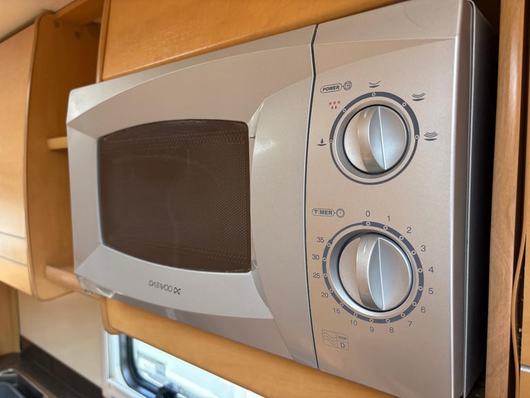 BAILEY OLYMPUS 525- 5 BERTH CARAVAN,DOUBLE DINETTE + MOTORMOVER
