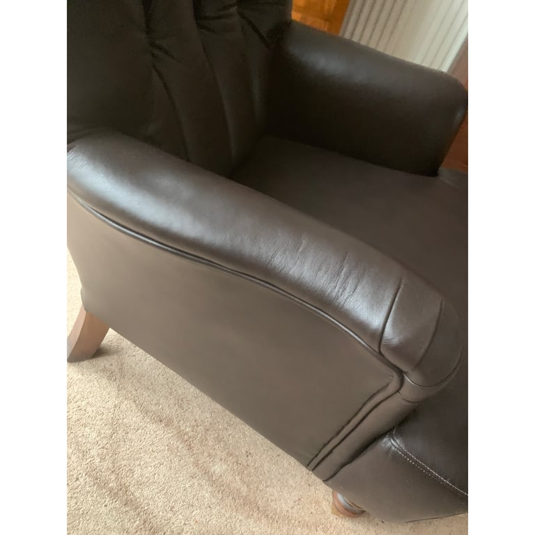 Superb brown leather club chair button back with castors 