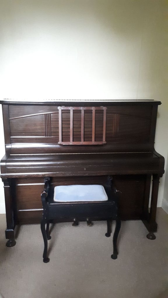 Upright piano and stool