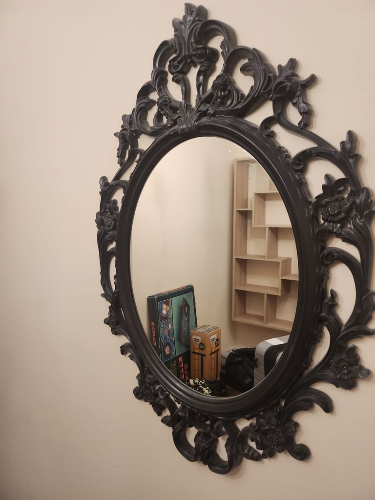 Black Baroque style mirror