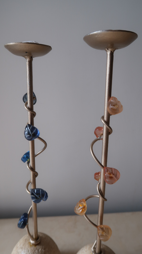 Candle holder, brand new, orangish pink and light blue resin leaves as decorations