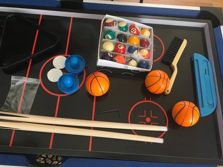 Four in one games table. Snooker,table tennis, air hockey and basketball.