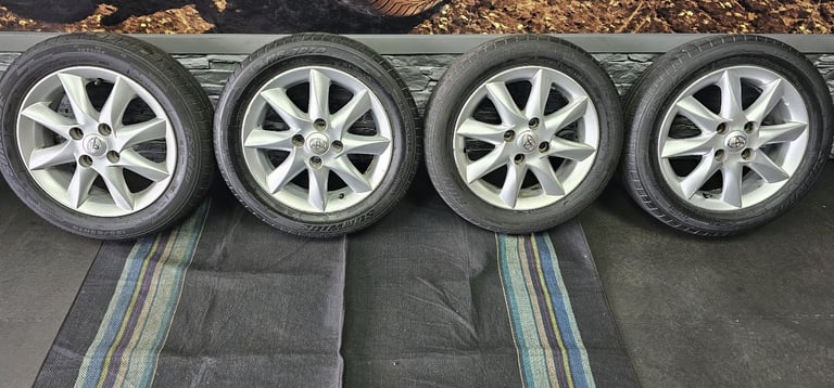 Toyota Genuine 14 alloy wheels + 4 x tyres 155 65 14 Sunwide