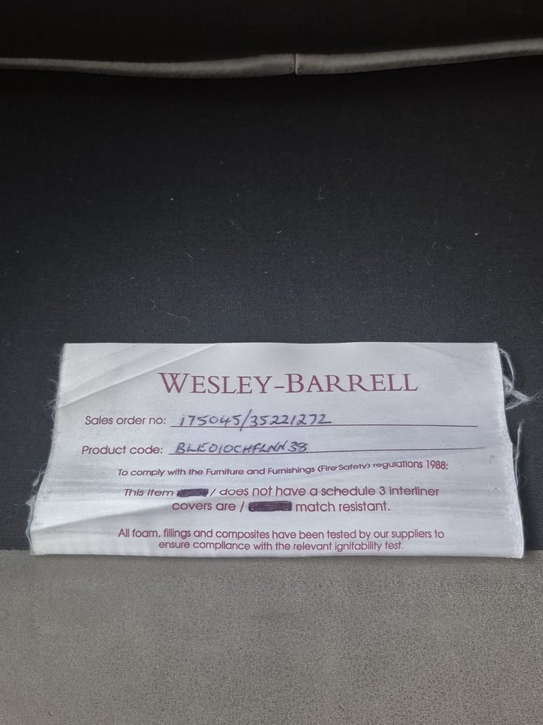 Wesley-Barrell Grey Leather Armchair