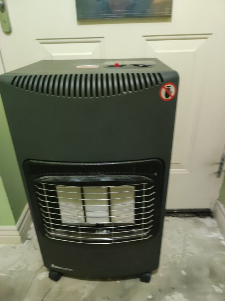 Gas depot , portable gas heater on wheels, plus 2 flo gas canisters 