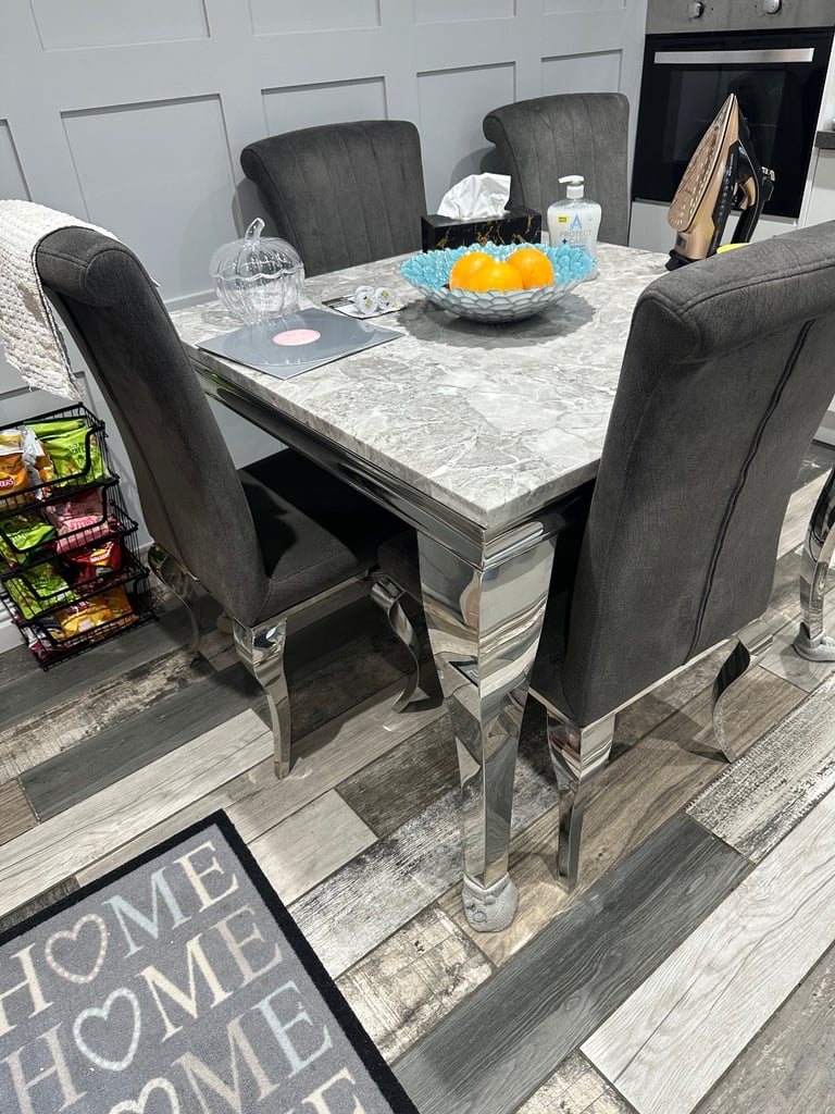 Beautiful 1metersquare marble table with Louie legs grey plush velvet chairs on Louie legs