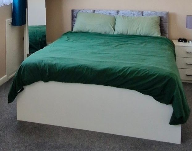 image for Ikea King-size bedframe without mattress.