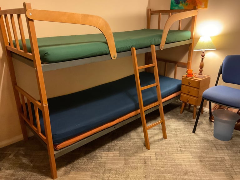 Sturdy bunk beds with mattresses
