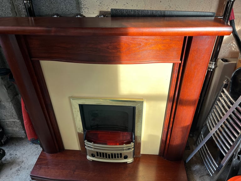 Electric coal effect fire place with solid wood surround 