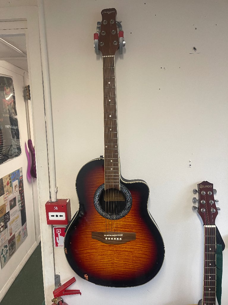 image for Martin Smith electro acoustic Bowl Round Back guitar Tiger Stripe Burst Brown?