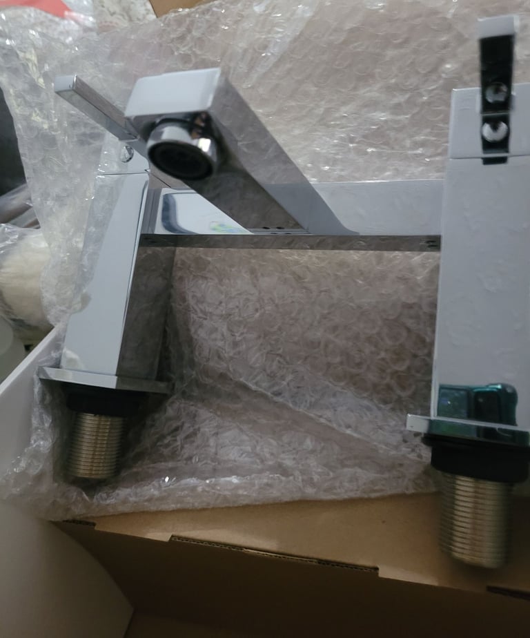 image for New bath taps
