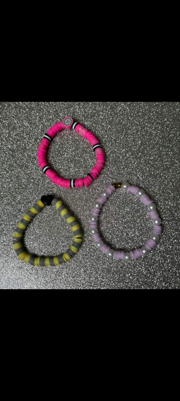 Bracelets any colour's and can add little charms what ever you want al