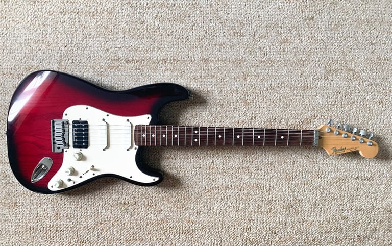 Fender Stratocaster. 1990 Strat Plus Deluxe. American. Rosewood. Crimson. Exceptional.