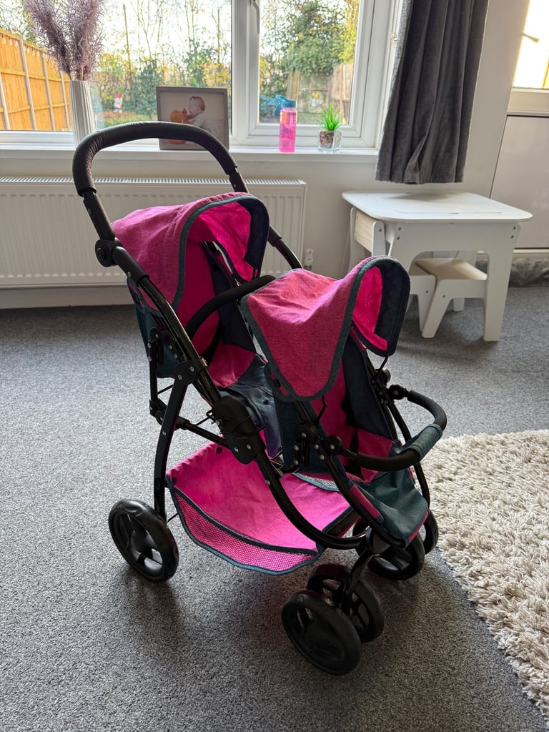 Kids double doll pushchair