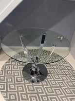 Next glass round dining table 