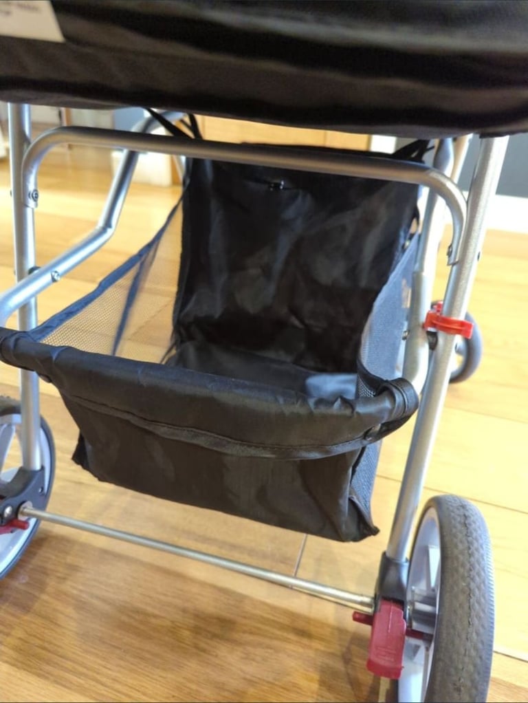 Black Foldable Pet Stroller with brakes, storage rack and safety/ rain cover