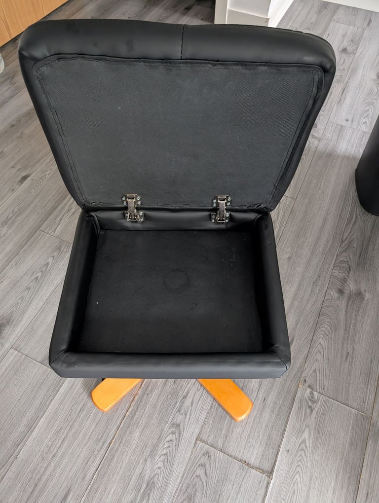 Black leather recliner chair with storage foot stool 
