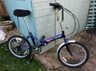 This is a challenge tornado folding bike in good condition 