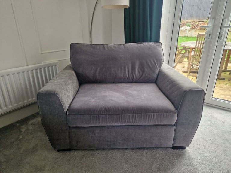 Grey snuggle chair 