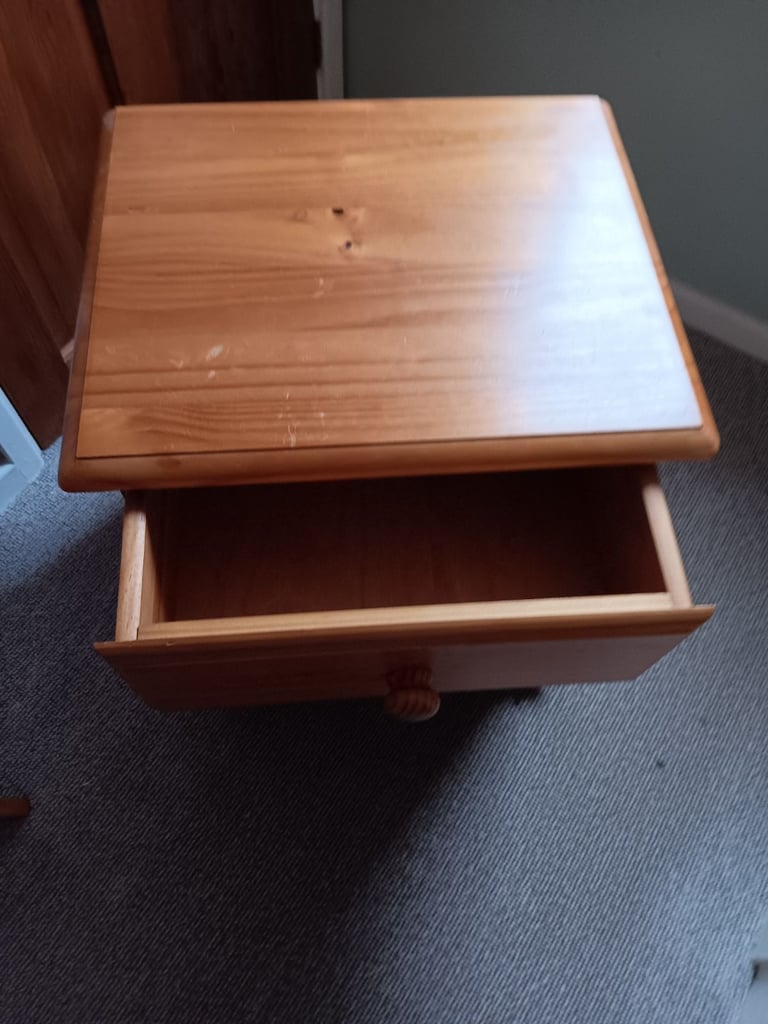 Matching bedroom furniture set in natural wood finish, includes: