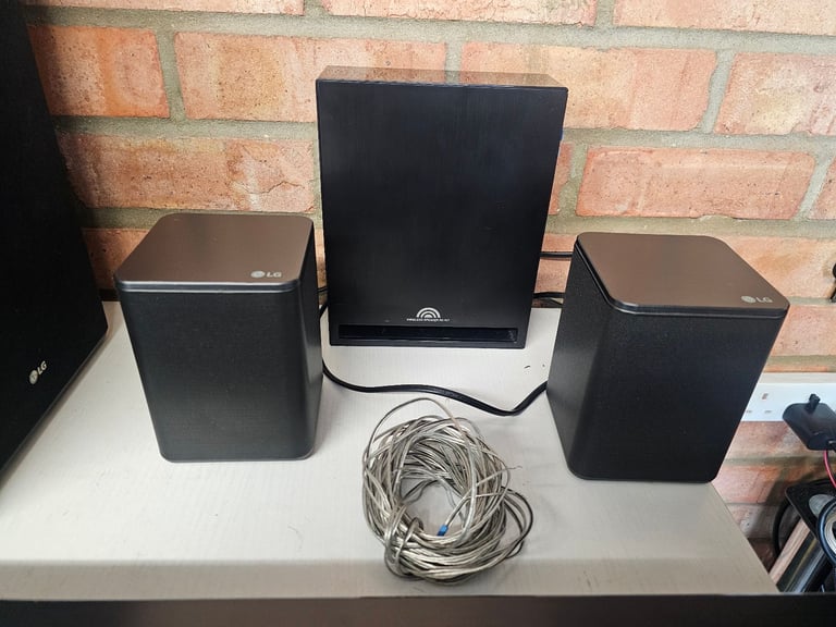 LG SL10YG Dolby Atmos & DTS:X 5.1.2 Soundbar + Wireless Subwoofer & Rear Speakers