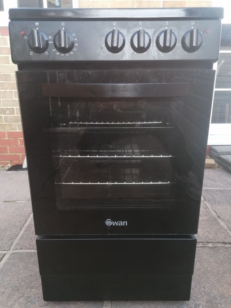 image for COOKER ELECTRIC COOKER OVEN AND GRILL 50CM WIDE SWAN ONLY A FEW MONTHS OLD CAN DELIVER £160