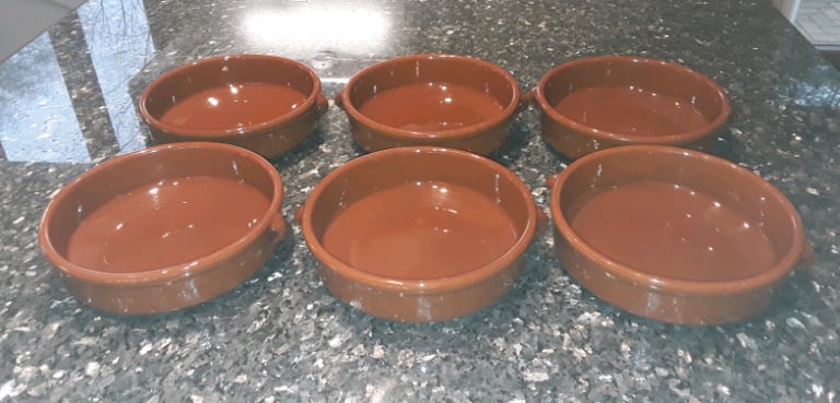6 Portugese substancial glazed clay cooking dishes.