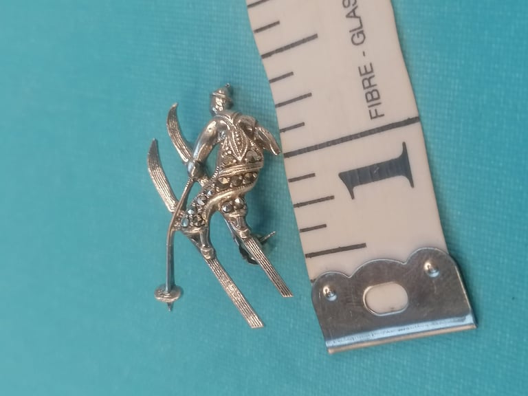 VINTAGE Brooch. Skier in mid - jump. 800  silver brooch. (missing one part as seen).
