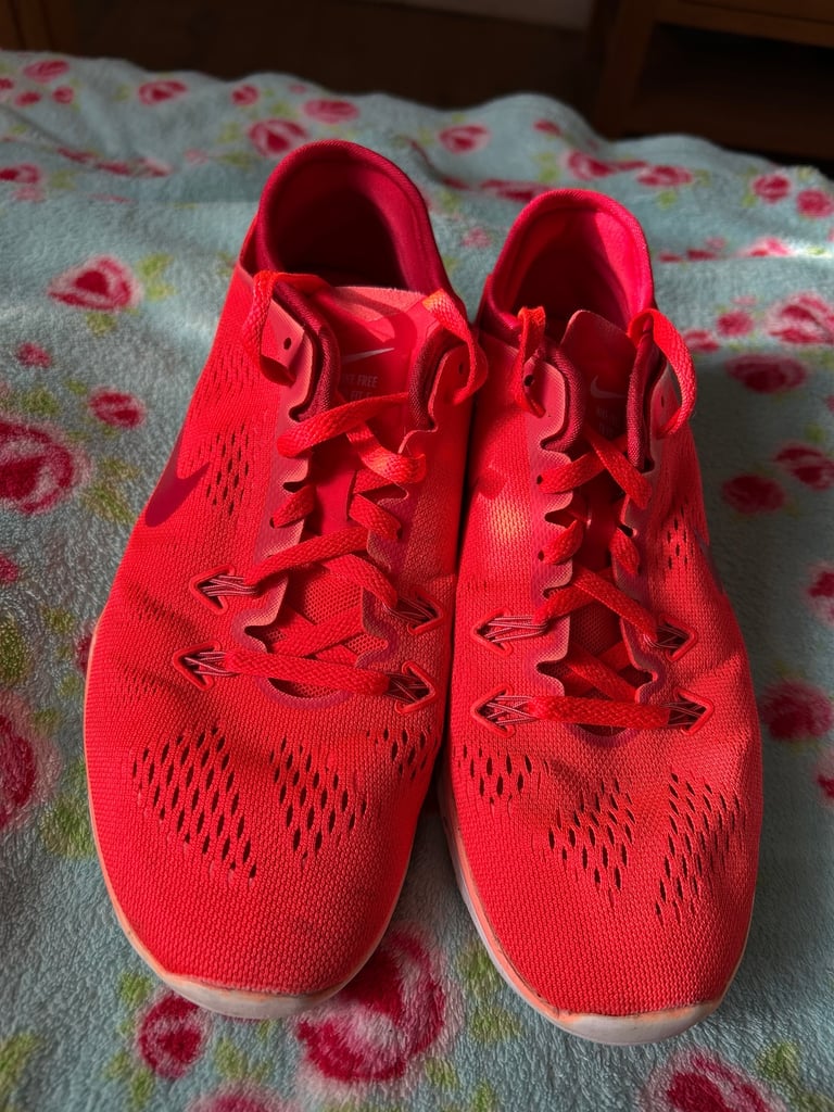 image for Nike - women’s orange trainers
