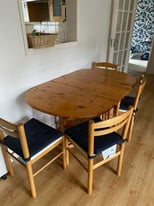 Wooden table with 5 chairs included. In good shape and condition