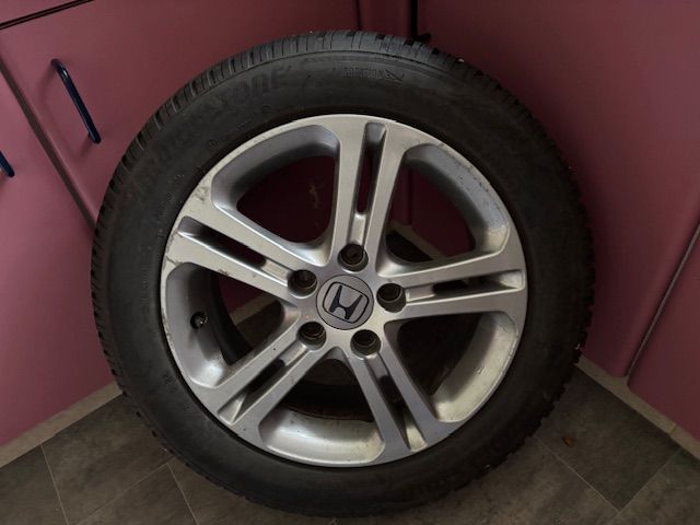 image for Alloy wheels for a Honda Civic complete with Bridgestone Blizzard Winter Tyres