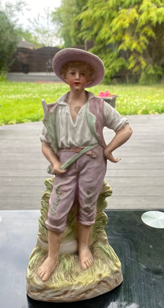 Statue of a young man