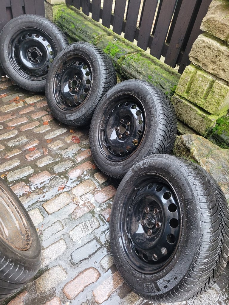 4x ford 5x 108 pcd steel wheels with 4 good matching michellin cross climate all season tyres